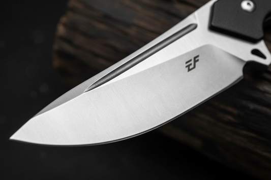 Ironclad Fixed Blade Knife extreme close up macro shot of the blade edge and steel detail